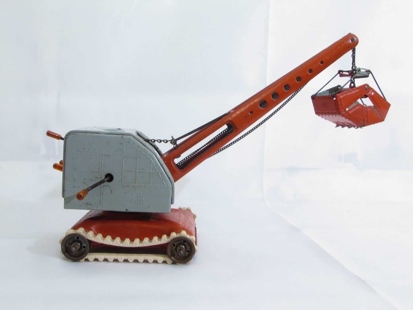 antique metal toy crane